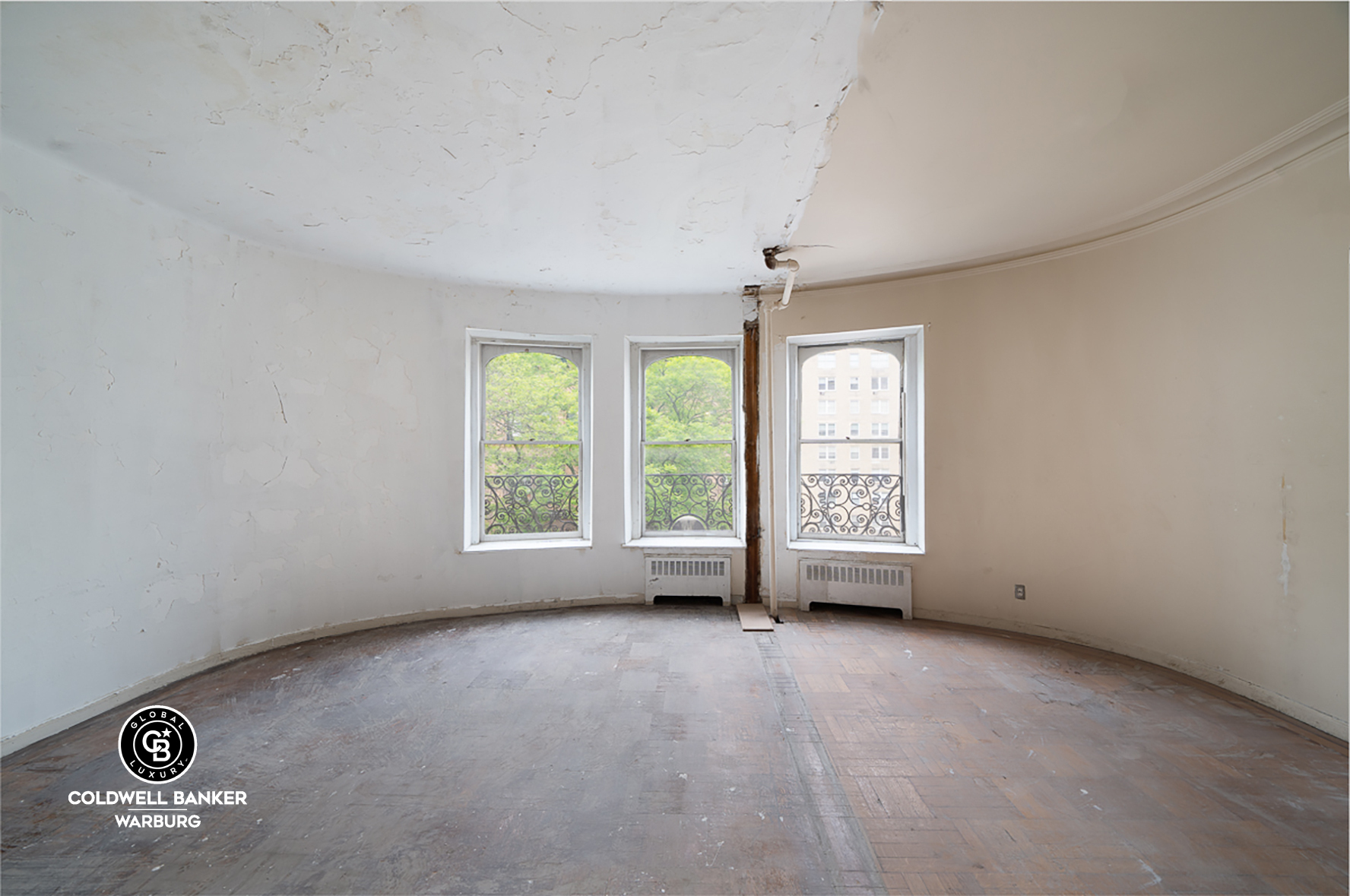 18 West 76th Street Manhattan, NY 10023 - Photo 9 of 19 an empty room with a empty space and windows
