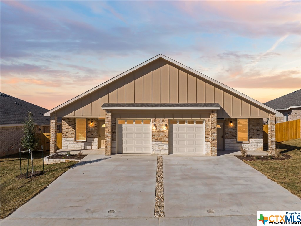 5007 Rose Garden Loop Killeen, TX 76542 - Photo 1 of 1 a front view of a house with a yard