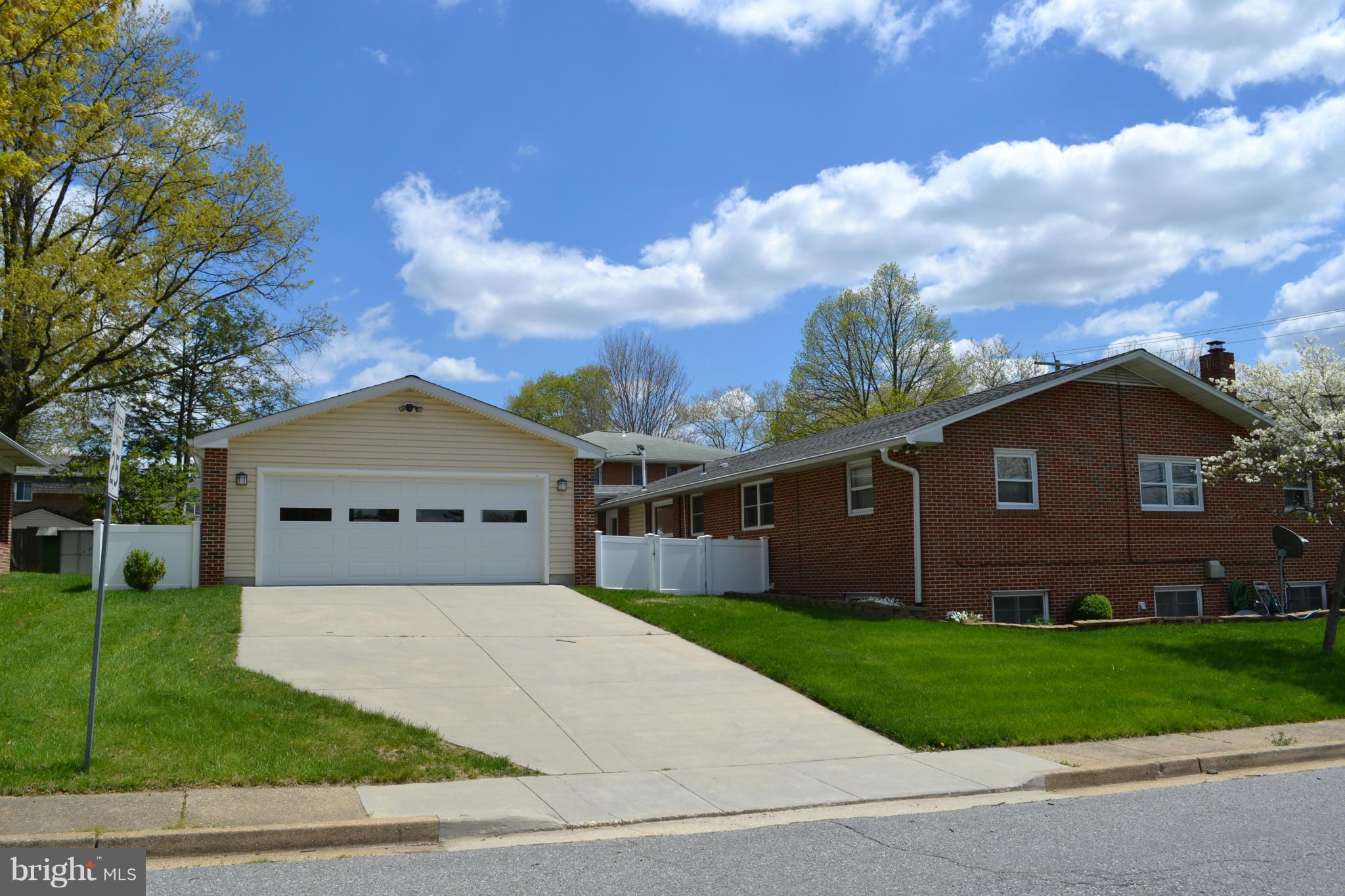 442 Andover Road Linthicum Heights, MD 21090 - Photo 2 of 8 a front view of a house with a yard and garage