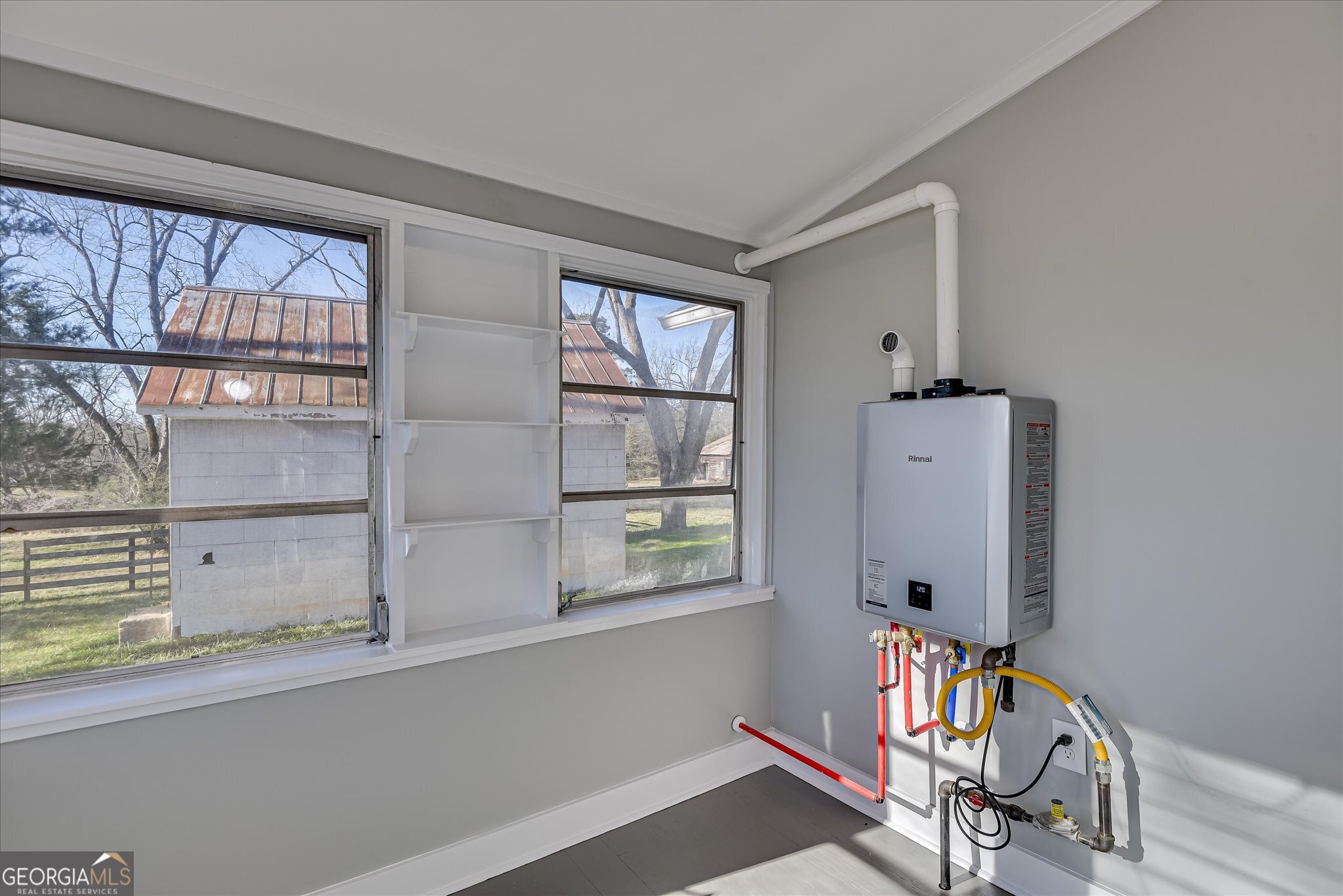 267 Garrard Road Washington, GA 30673 - Photo 31 of 74 a view of an entryway with wooden floor and a window
