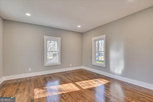 a view of a backyard of the house