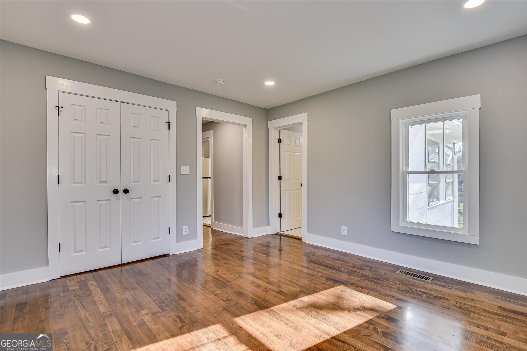 267 Garrard Road Washington, GA 30673 - Photo 42 of 74 wooden floor in an empty room with a window
