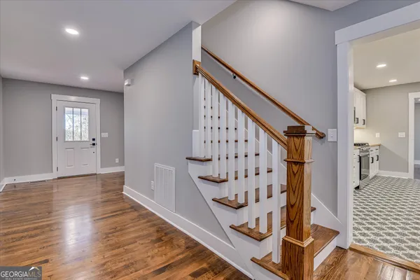 front view of a house with a large window