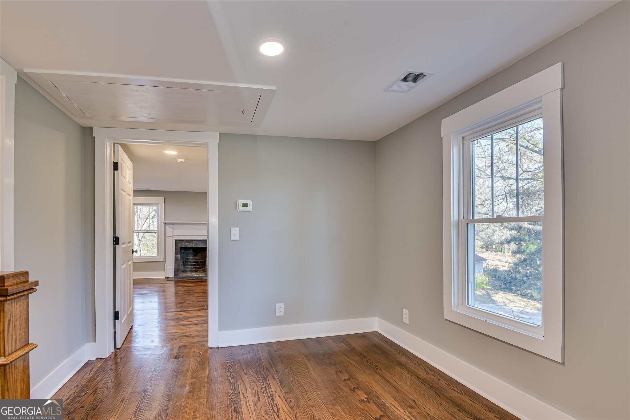 267 Garrard Road Washington, GA 30673 - Photo 47 of 74 wooden floor in an empty room with a window