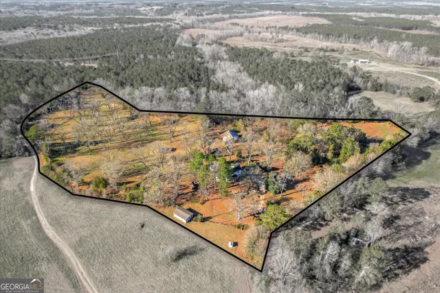 a view of swimming pool with a yard