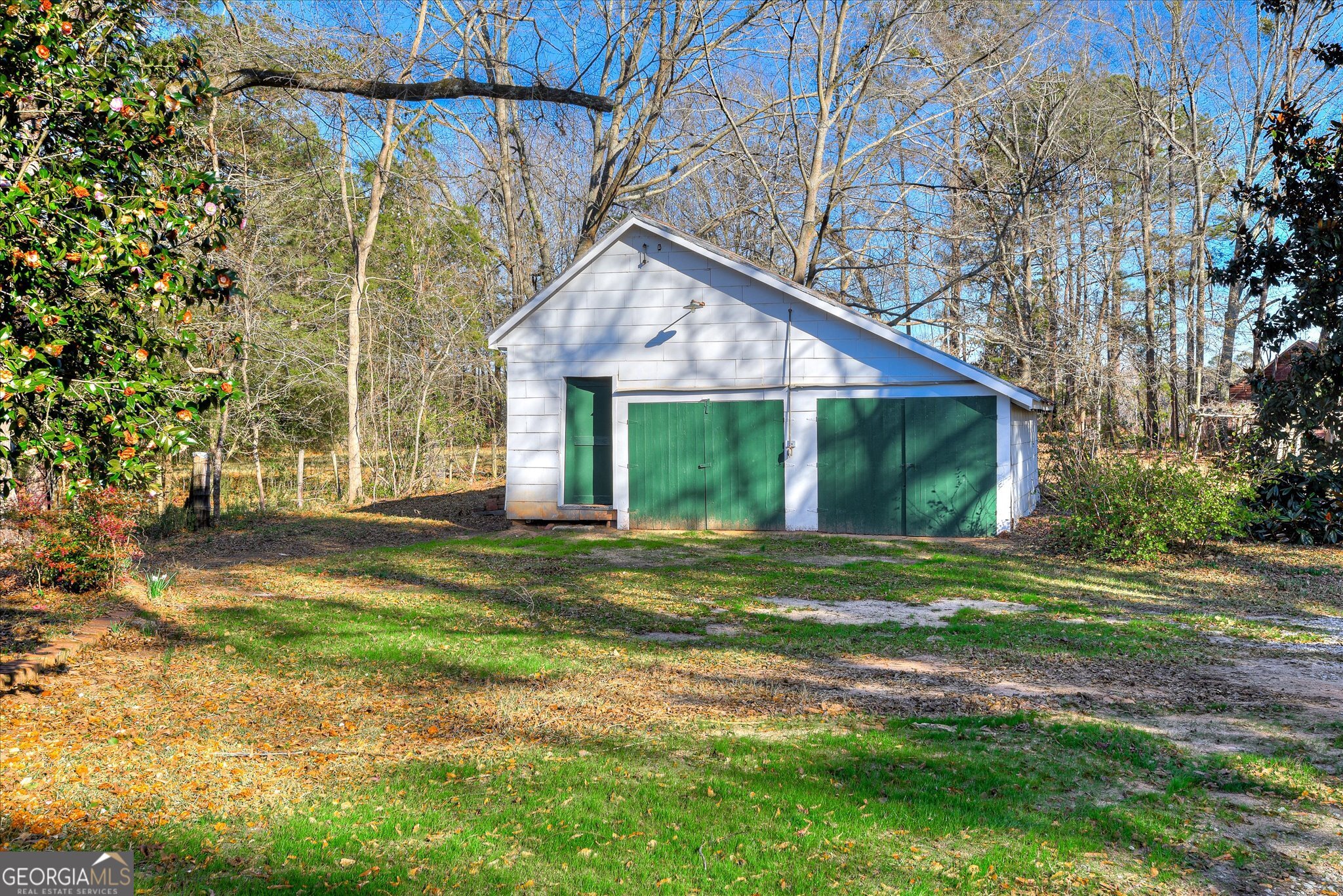 267 Garrard Road Washington, GA 30673 - Photo 66 of 74 a front view of a house with a yard and trees