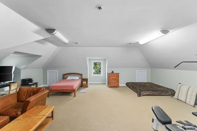 a bedroom with furniture and a couch