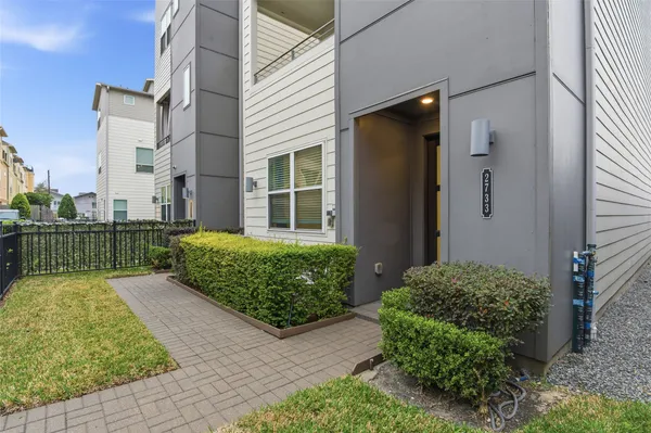 a view of a garden with pathway