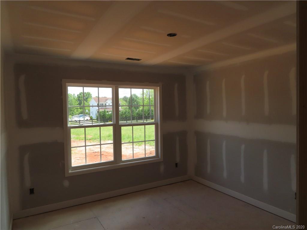 2219 Cedar Road York, SC 29745 - Photo 11 of 14 a view of an empty room with a window