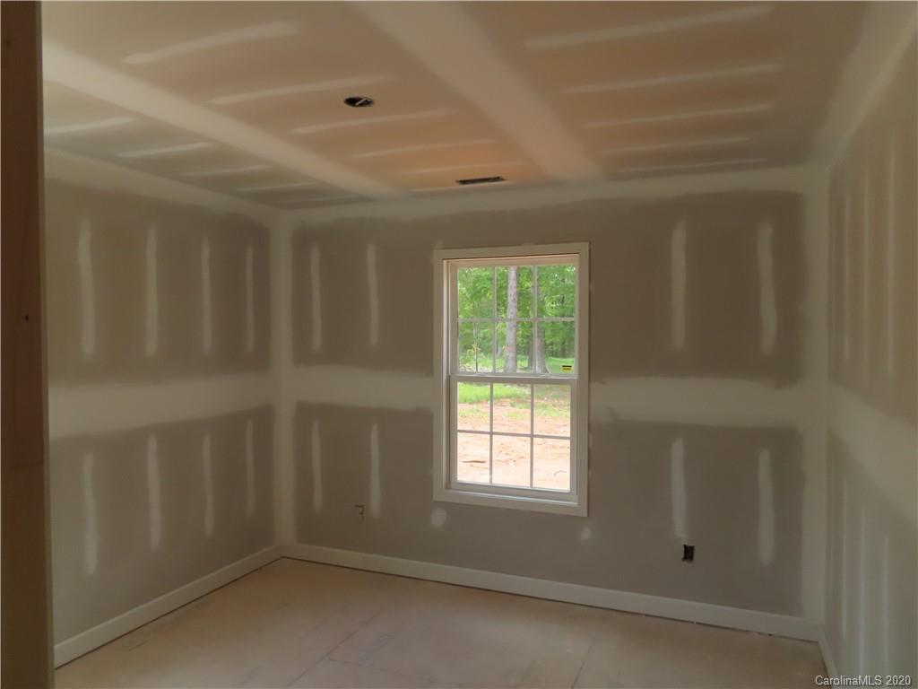 2219 Cedar Road York, SC 29745 - Photo 12 of 14 a view of an empty room with a window