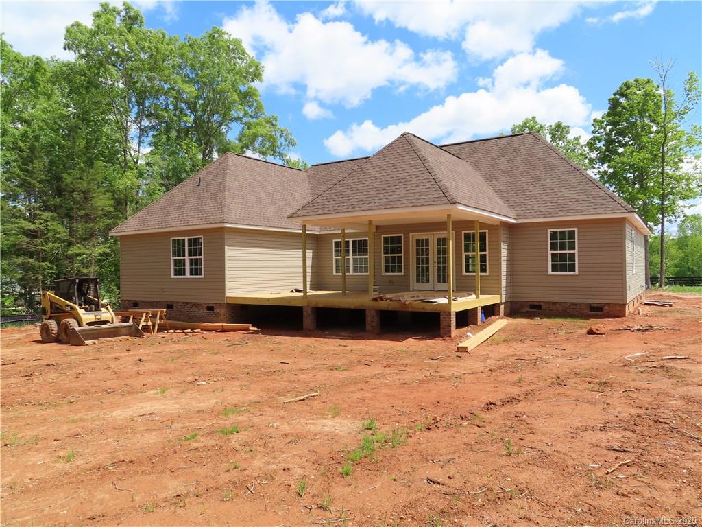 2219 Cedar Road York, SC 29745 - Photo 3 of 14 a view of a house with a yard covered with snow in front of house