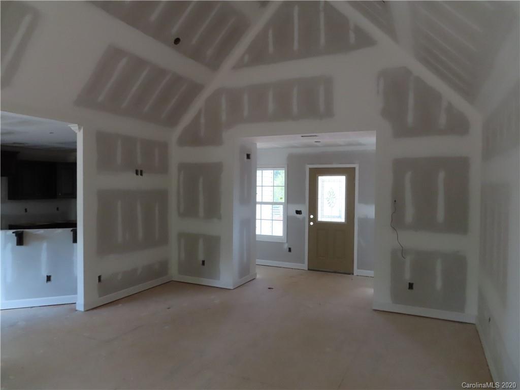 2219 Cedar Road York, SC 29745 - Photo 6 of 14 wooden floor and window in an empty room