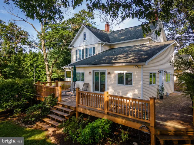 a kitchen with stainless steel appliances a refrigerator and a stove