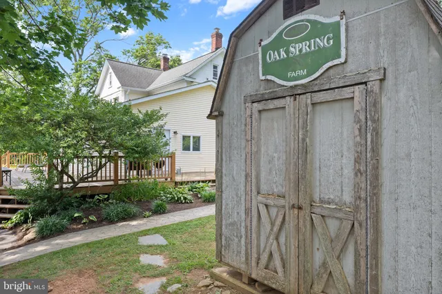 a view of swimming pool with a yard