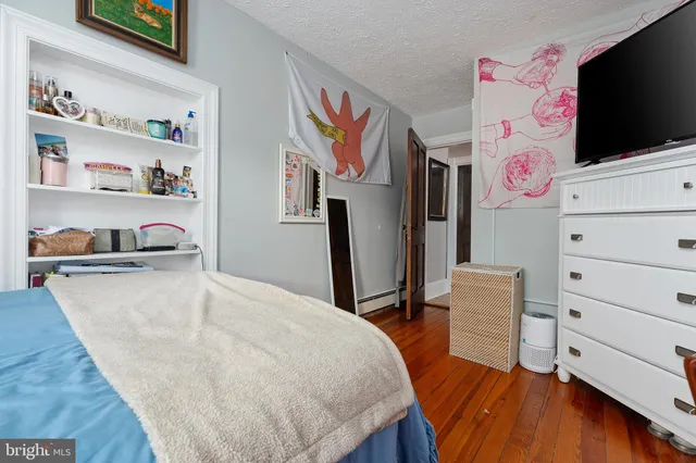 a view of a city with an ocean view