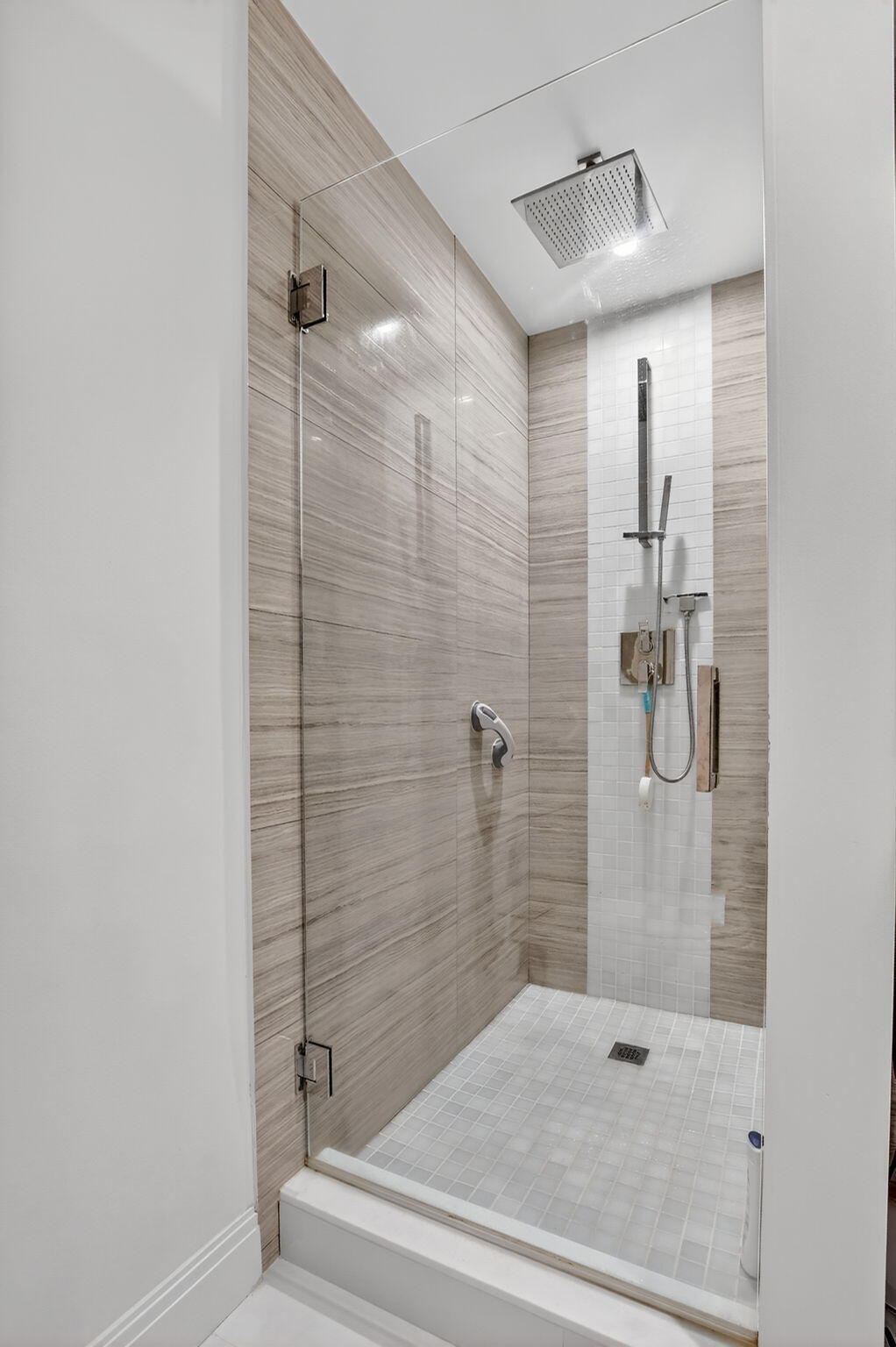 7535 La Paz Boulevard, Unit 105 Boca Raton, FL 33433 - Photo 28 of 54 a bathroom with a shower and a bathtub