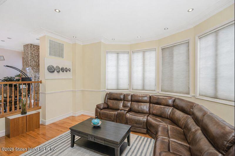 5125 Amboy Road Staten Island, NY 10312 - Photo 13 of 33 a living room with furniture and a window