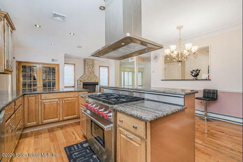 5125 Amboy Road Staten Island, NY 10312 - Photo 17 of 33 a kitchen with stainless steel appliances granite countertop a stove and a sink