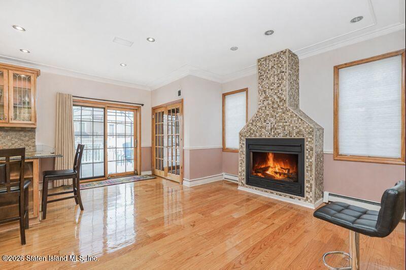 5125 Amboy Road Staten Island, NY 10312 - Photo 20 of 33 a living room with furniture and a fireplace