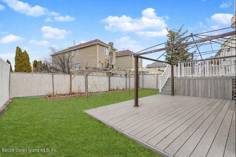 5125 Amboy Road Staten Island, NY 10312 - Photo 22 of 33 a house with garden in front of it