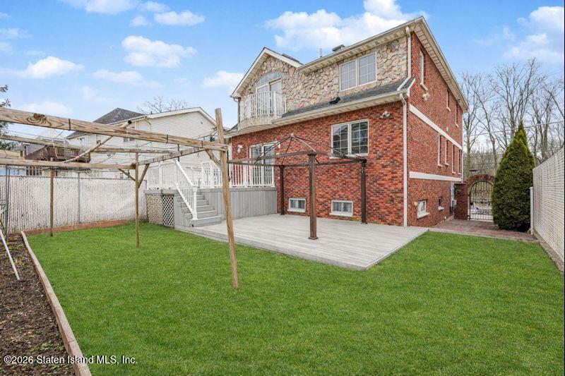 5125 Amboy Road Staten Island, NY 10312 - Photo 6 of 33 a house view with a garden space