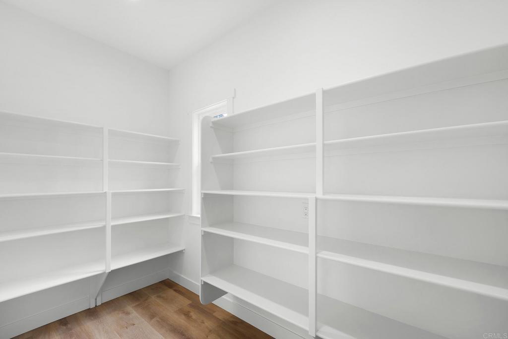1547 Dickey Street Fallbrook, CA 92028 - Photo 16 of 45 a view of walk in closet with empty racks