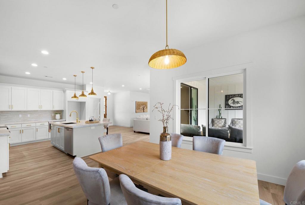 1547 Dickey Street Fallbrook, CA 92028 - Photo 19 of 45 a kitchen with a table and chairs in it