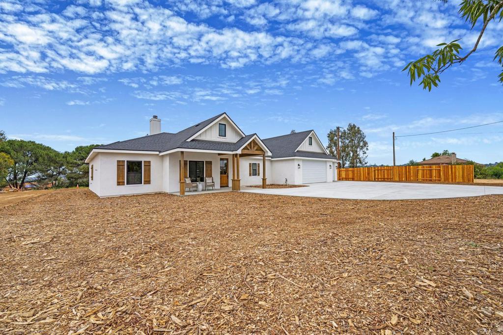 1547 Dickey Street Fallbrook, CA 92028 - Photo 2 of 45 a front view of a house with a yard