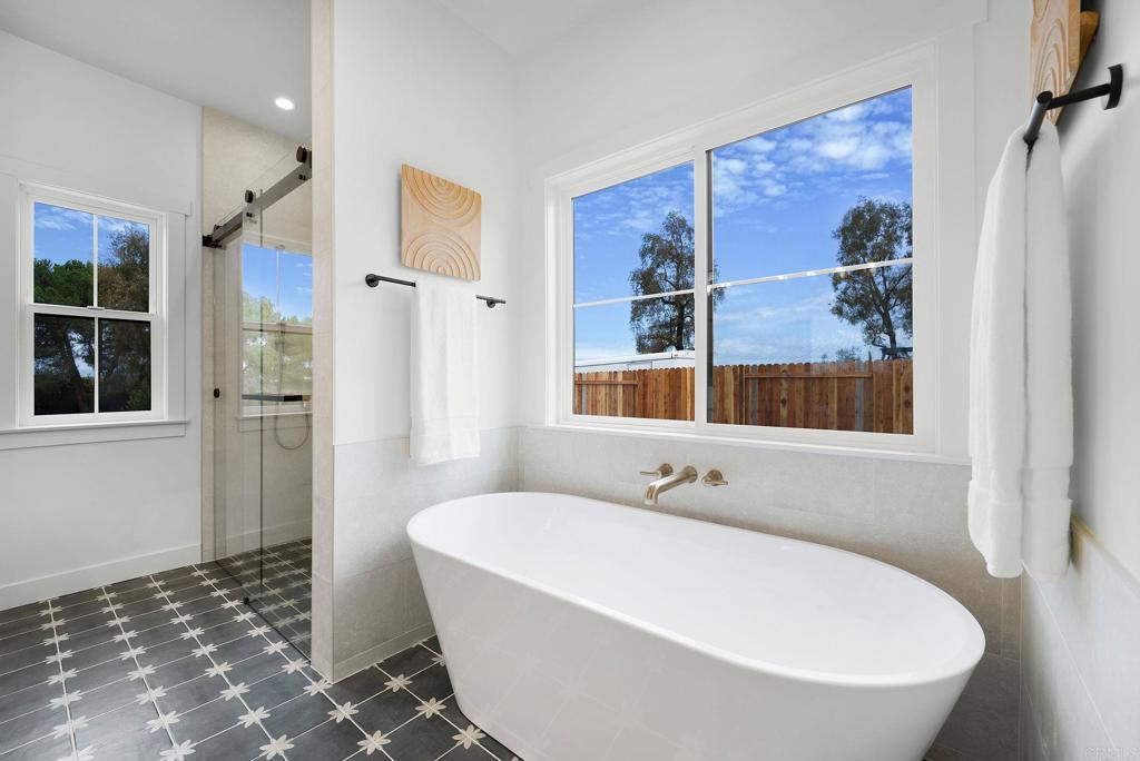 1547 Dickey Street Fallbrook, CA 92028 - Photo 26 of 45 a white bath tub sitting next to a bathroom