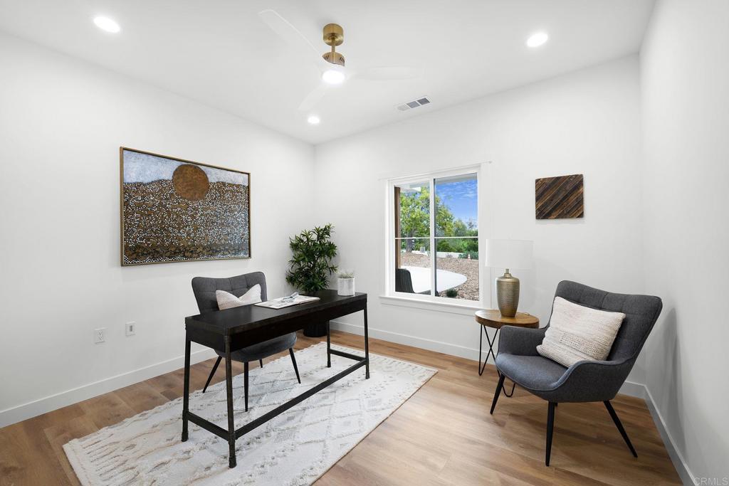 1547 Dickey Street Fallbrook, CA 92028 - Photo 31 of 45 a living room with furniture and a window