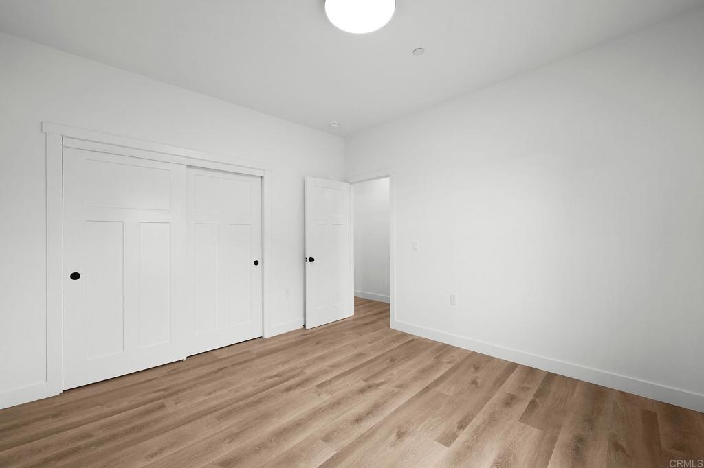 1547 Dickey Street Fallbrook, CA 92028 - Photo 34 of 45 a view of an empty room and wooden floor