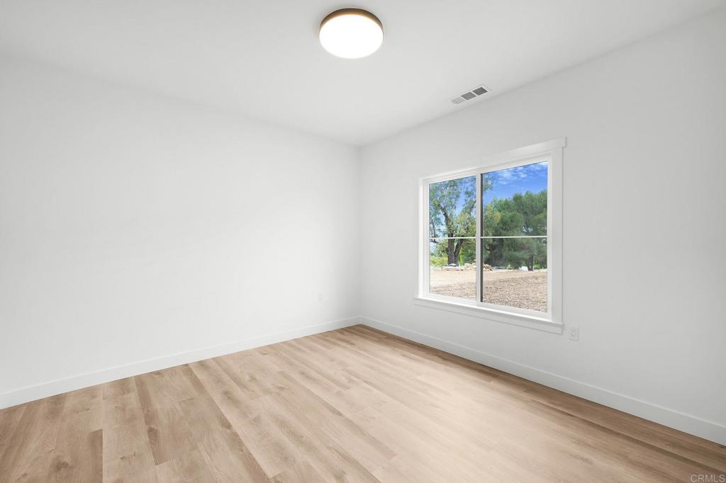 1547 Dickey Street Fallbrook, CA 92028 - Photo 36 of 45 an empty room with a window