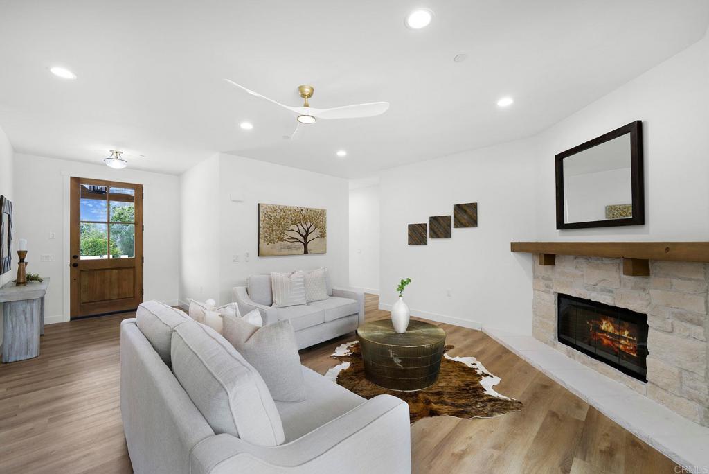 1547 Dickey Street Fallbrook, CA 92028 - Photo 5 of 45 a living room with furniture and a fireplace