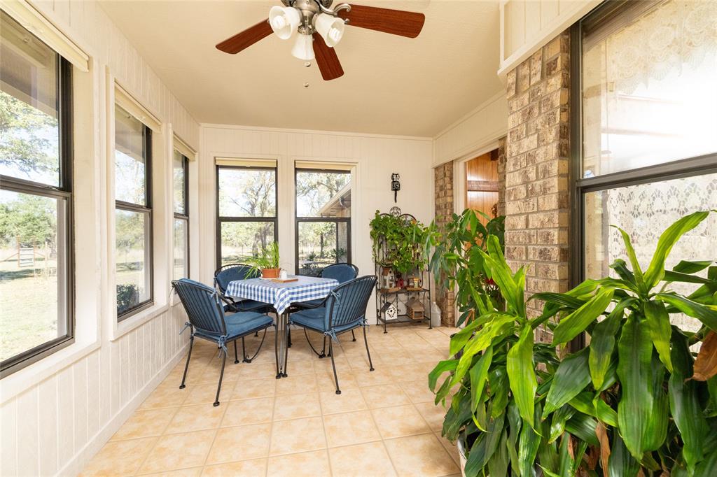 970 Live Oak Road Santo, TX 76472 - Photo 22 of 40 a dining room with furniture and window