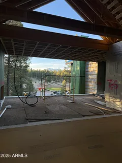 a swimming pool with outdoor seating