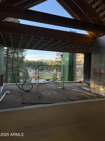 a swimming pool with outdoor seating