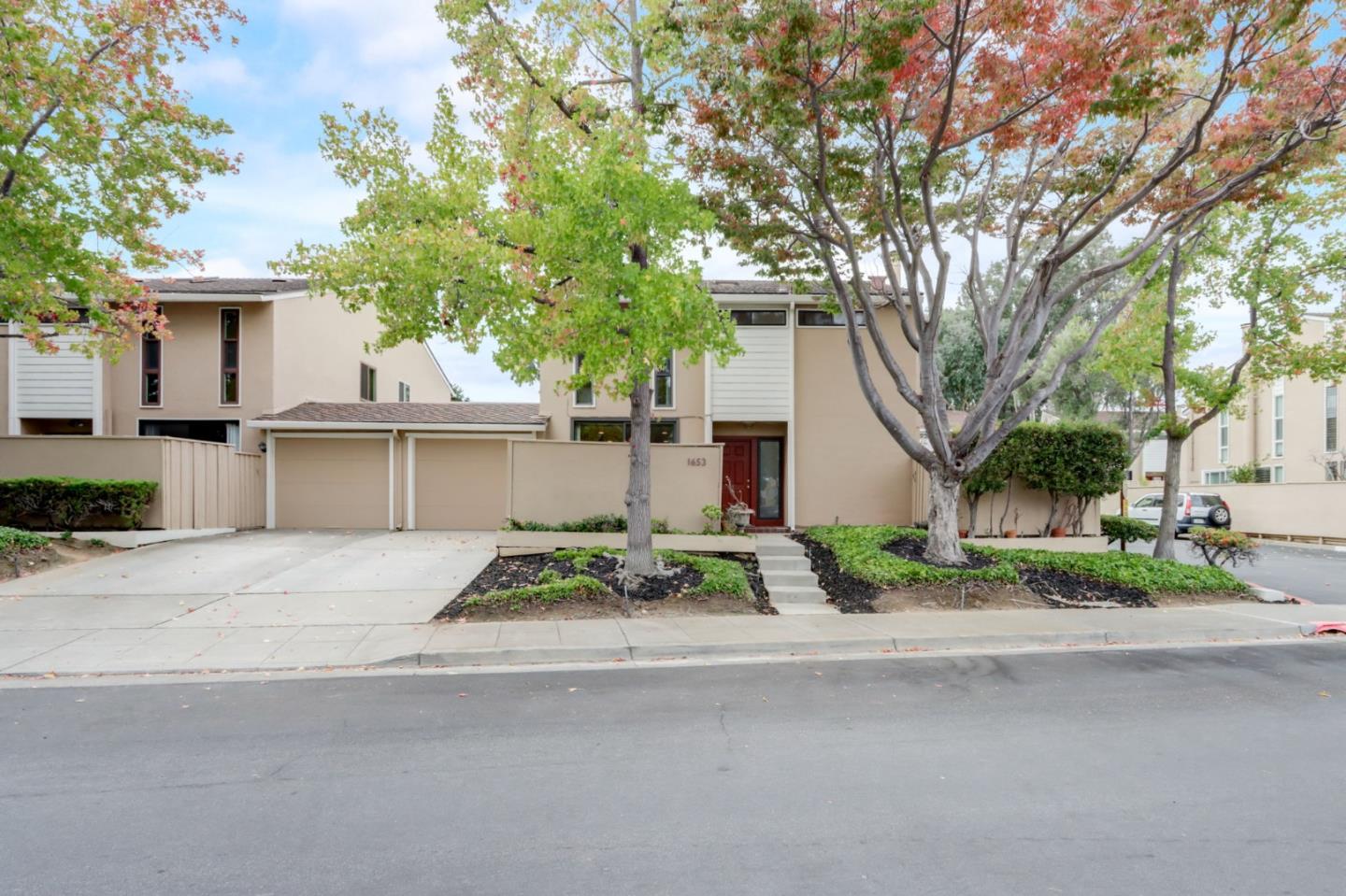 1653 Albatross Drive Sunnyvale, CA 94087 - Photo 2 of 44 a white house with a tree in front of it