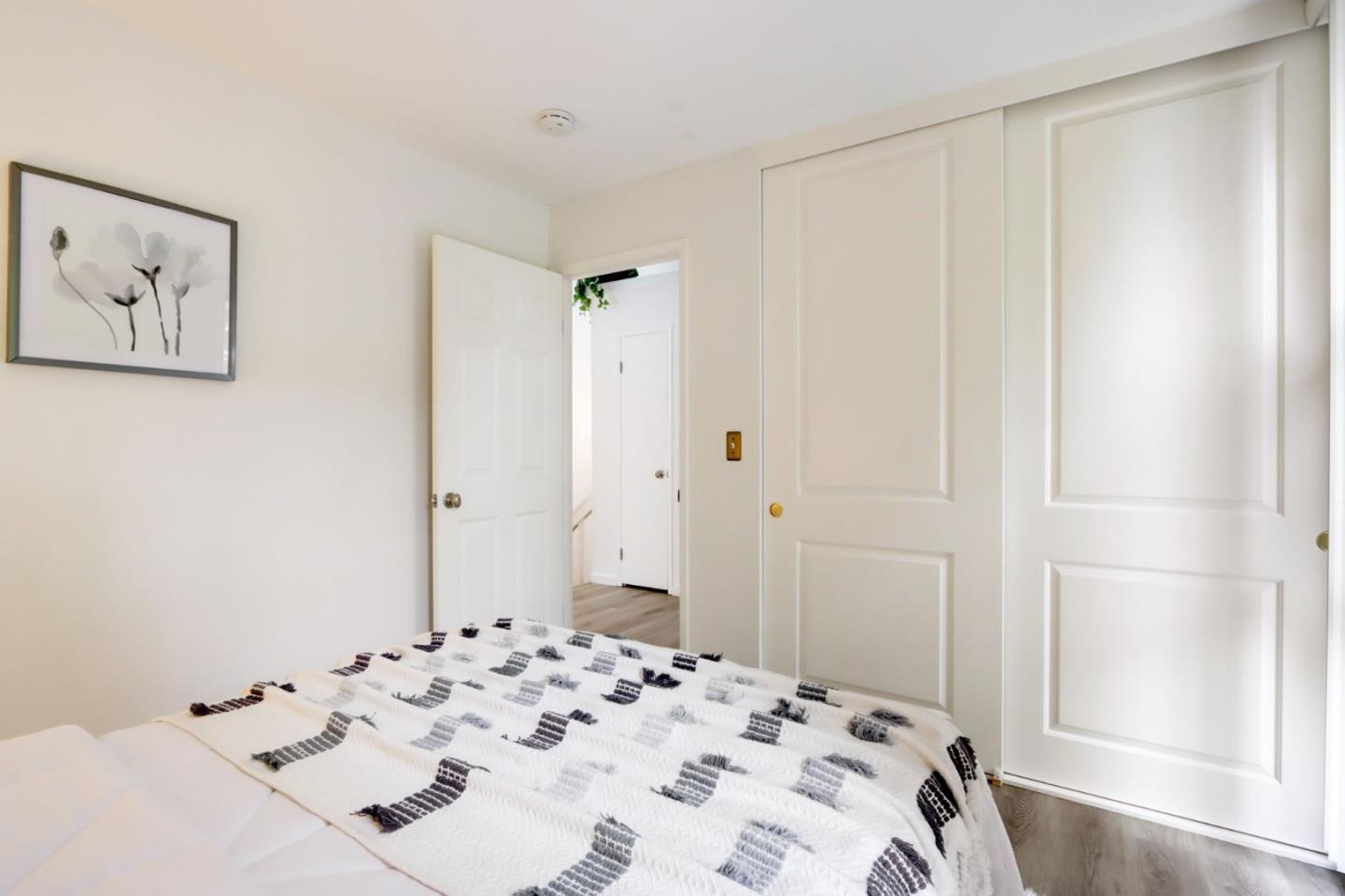 1653 Albatross Drive Sunnyvale, CA 94087 - Photo 22 of 44 a bedroom with a bed and a window