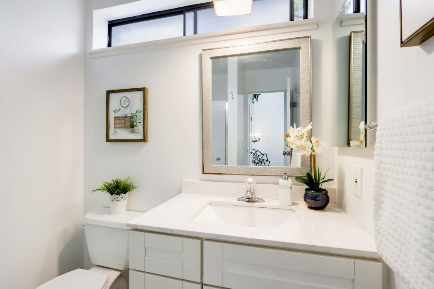 1653 Albatross Drive Sunnyvale, CA 94087 - Photo 23 of 44 a bathroom with a sink and a mirror