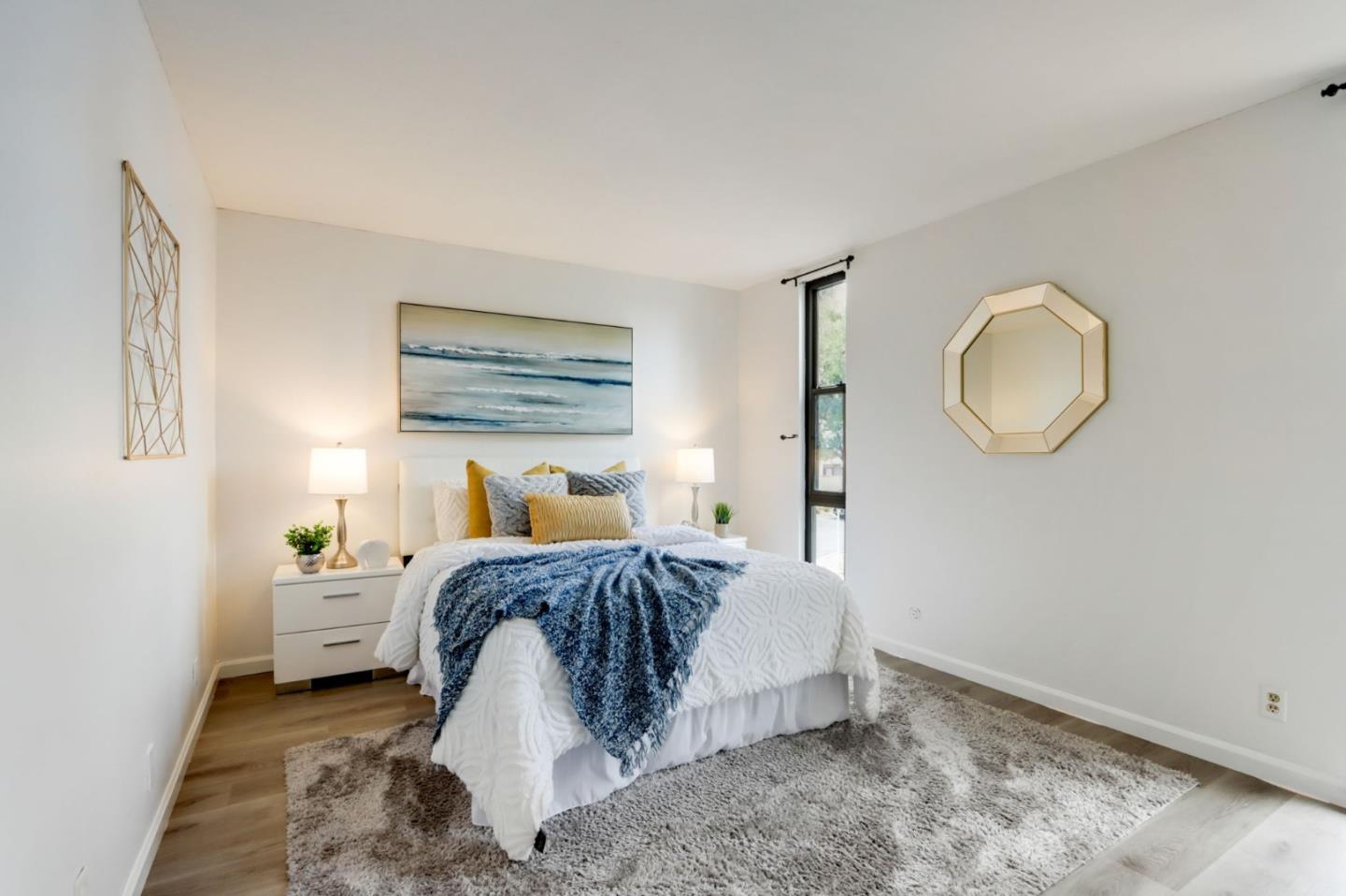 1653 Albatross Drive Sunnyvale, CA 94087 - Photo 24 of 44 a bedroom with a bed and window