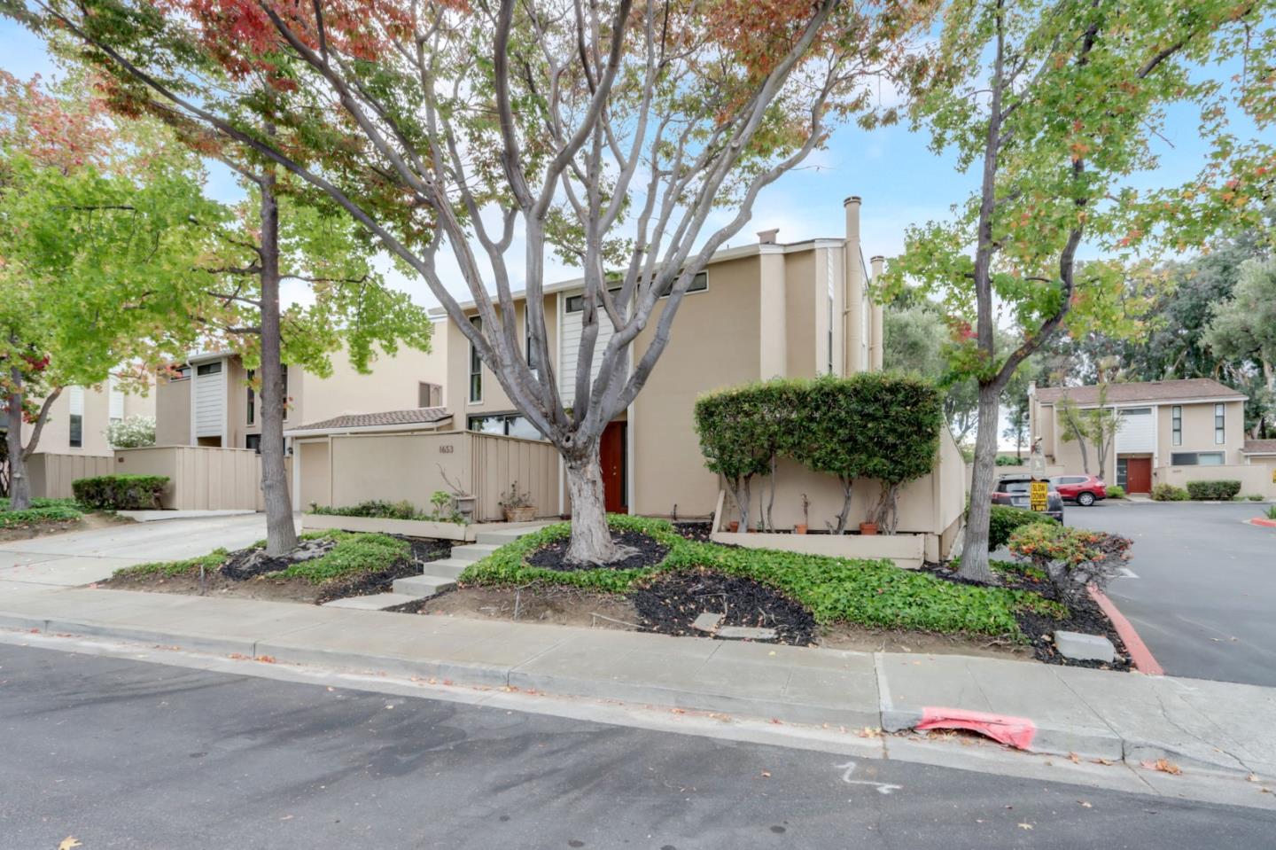 1653 Albatross Drive Sunnyvale, CA 94087 - Photo 3 of 44 a front view of a house with garden and a tree
