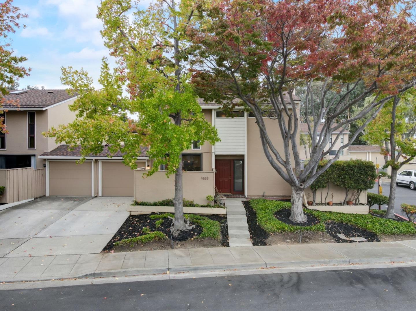 1653 Albatross Drive Sunnyvale, CA 94087 - Photo 36 of 44 a front view of a house with garage and plants