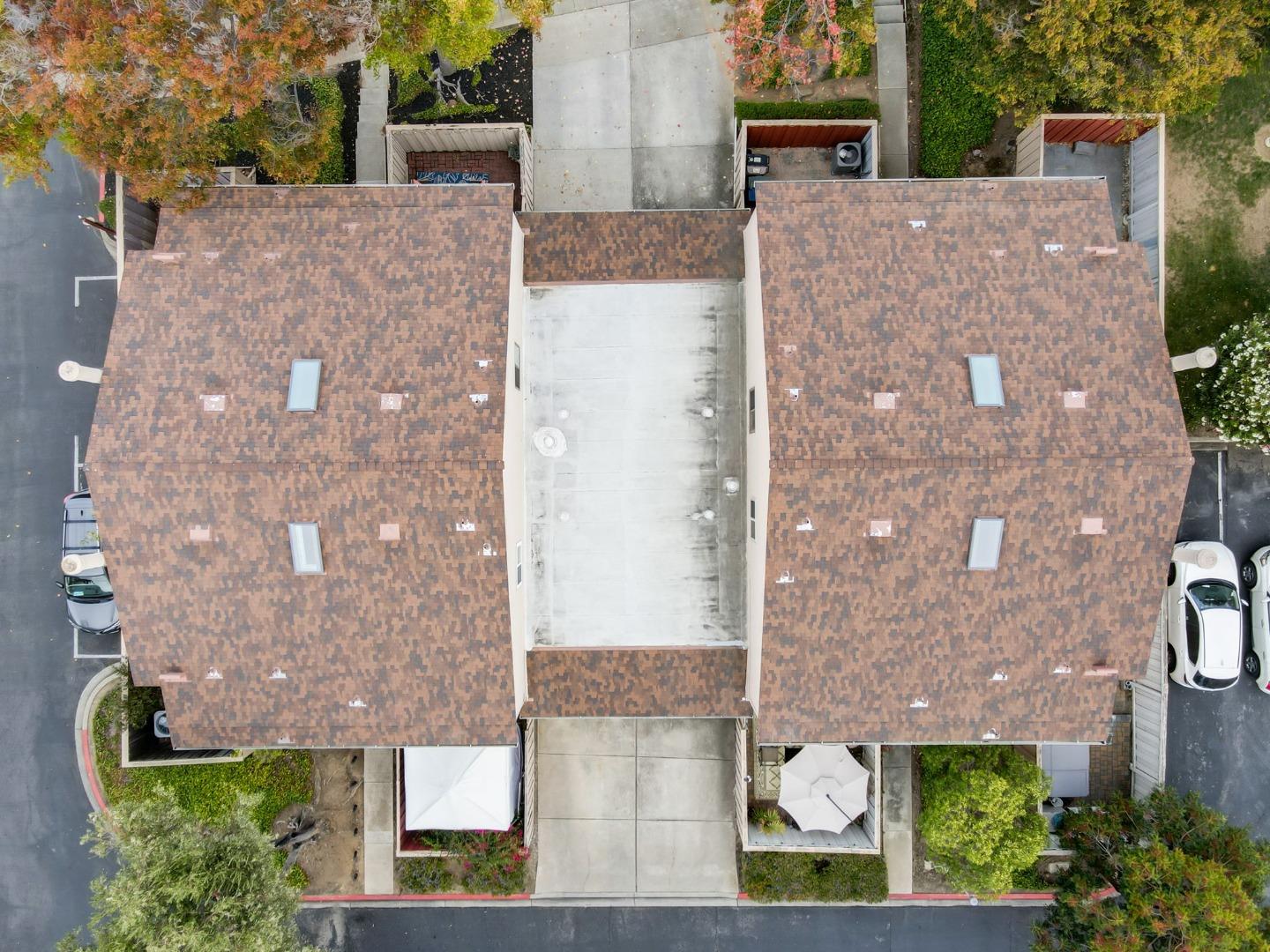 1653 Albatross Drive Sunnyvale, CA 94087 - Photo 43 of 44 front view of a brick house with a small yard and large trees