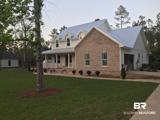 5598 Millhouse Road Gulf Shores, AL 36542 - Photo 2 of 29 Front of house