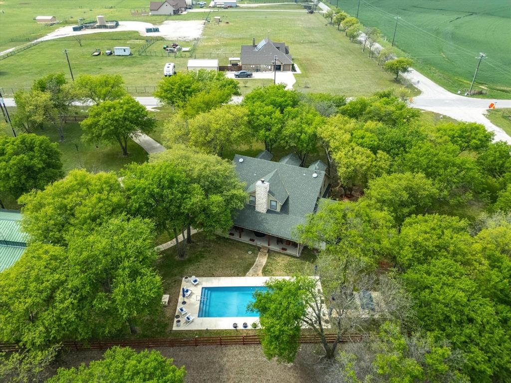 1990 Ripy Road Krum, TX 76249 - Photo 38 of 40 an aerial view of a house with yard swimming pool and outdoor seating