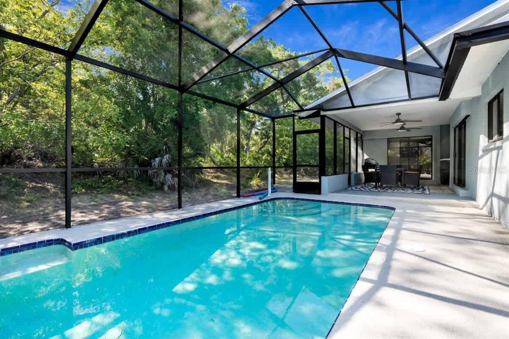 13501 Whitby Road Hudson, FL 34667 - Photo 24 of 25 a view of yard with outdoor seating