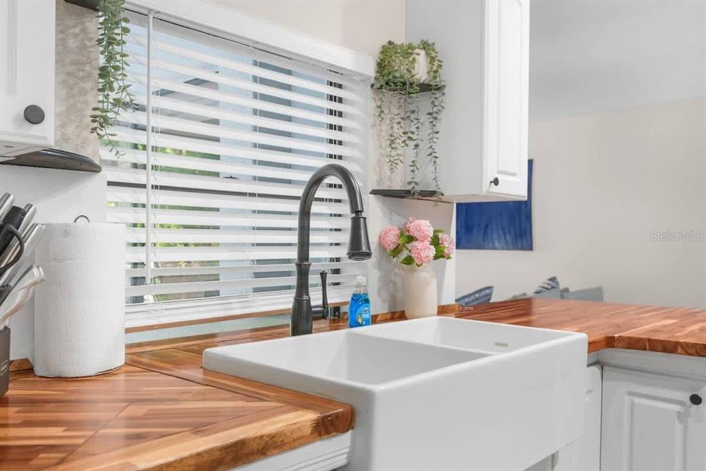 13501 Whitby Road Hudson, FL 34667 - Photo 10 of 25 a bathroom with a sink and a mirror