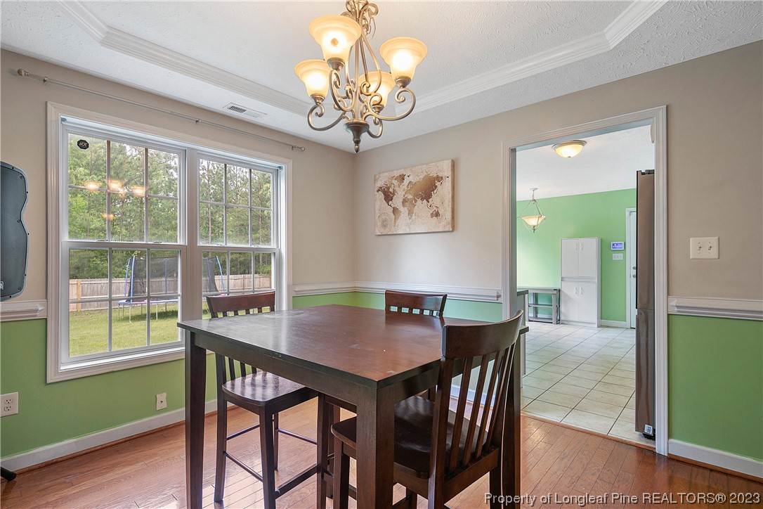 250 Pender Road Spring Lake, NC 28390 - Photo 12 of 50 a view of a dining room with furniture window and outside view