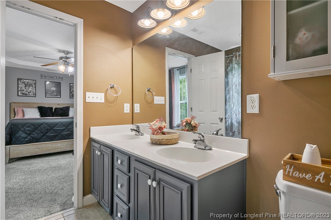 250 Pender Road Spring Lake, NC 28390 - Photo 29 of 50 a view of bathroom with dual sinks