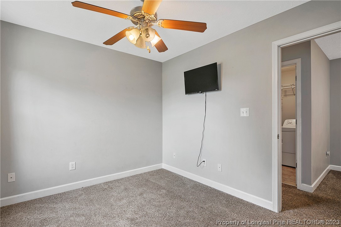 250 Pender Road Spring Lake, NC 28390 - Photo 33 of 50 an empty room with windows and fan